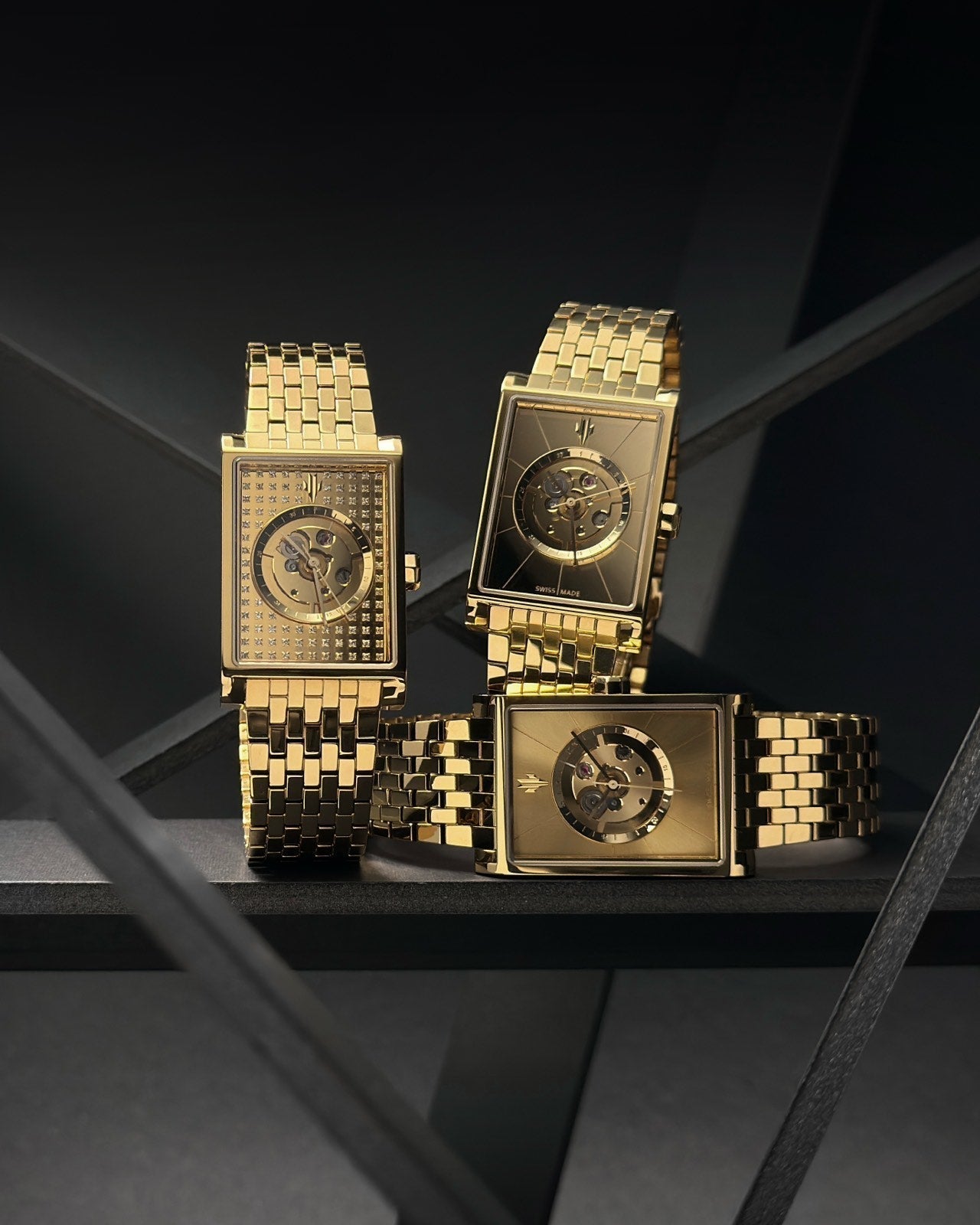 Luxury gold rectangular watches with Swiss automatic movements and skeleton dials in a trio