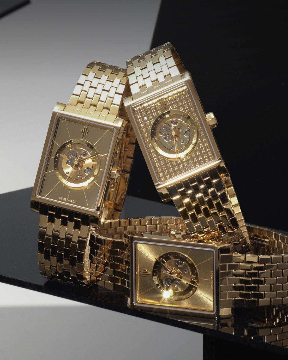 Luxury gold rectangular watches featuring Swiss automatic movements and skeleton dials trio