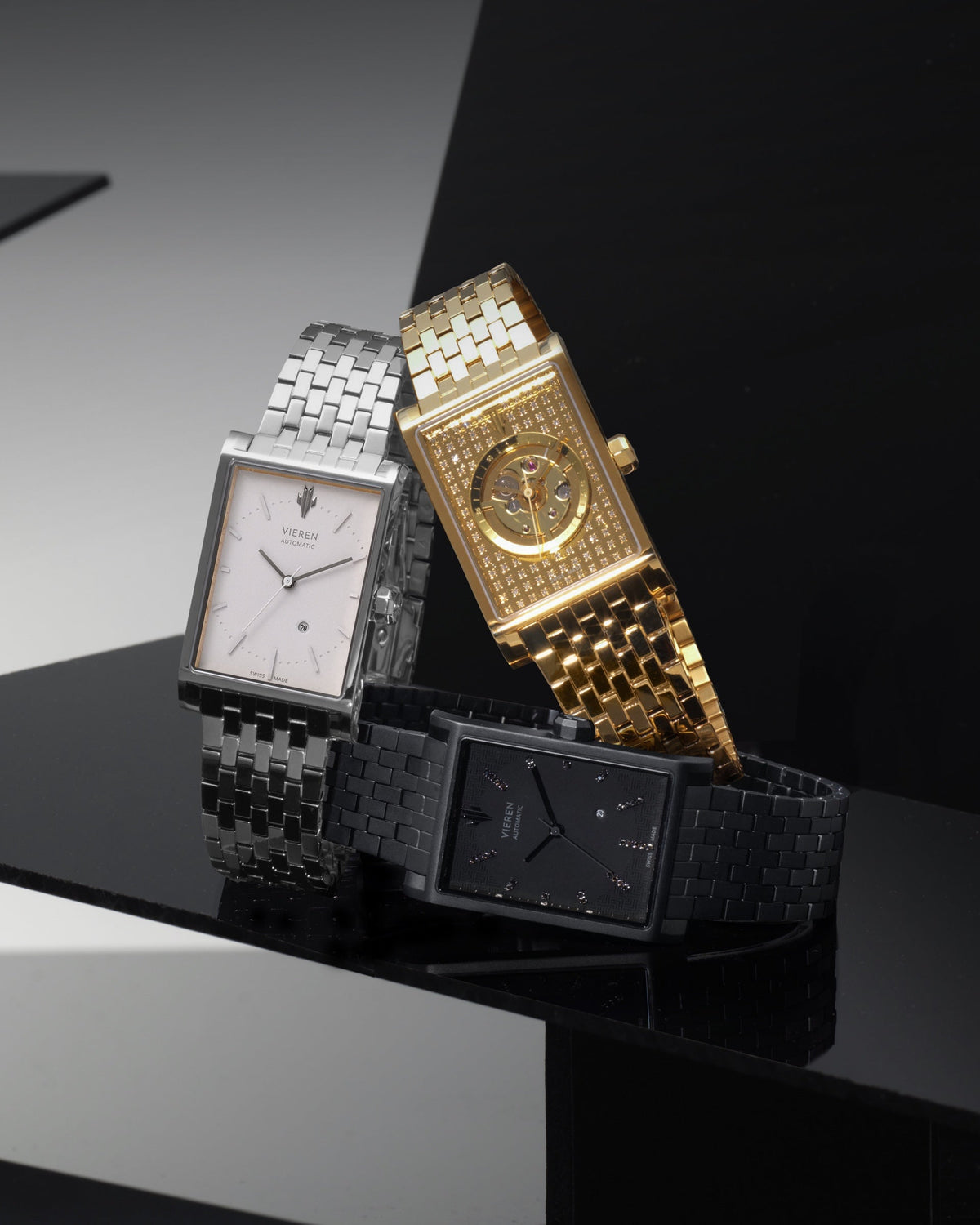 Luxury rectangular watches in gold, silver, and black with Swiss Made automatic movements, diamond and skeleton dials