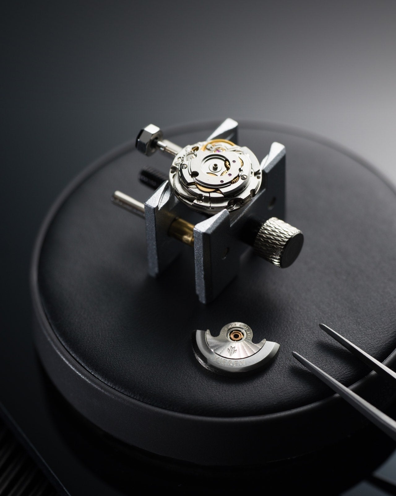 Luxury Swiss automatic watch movement with rotor removed showcasing gears