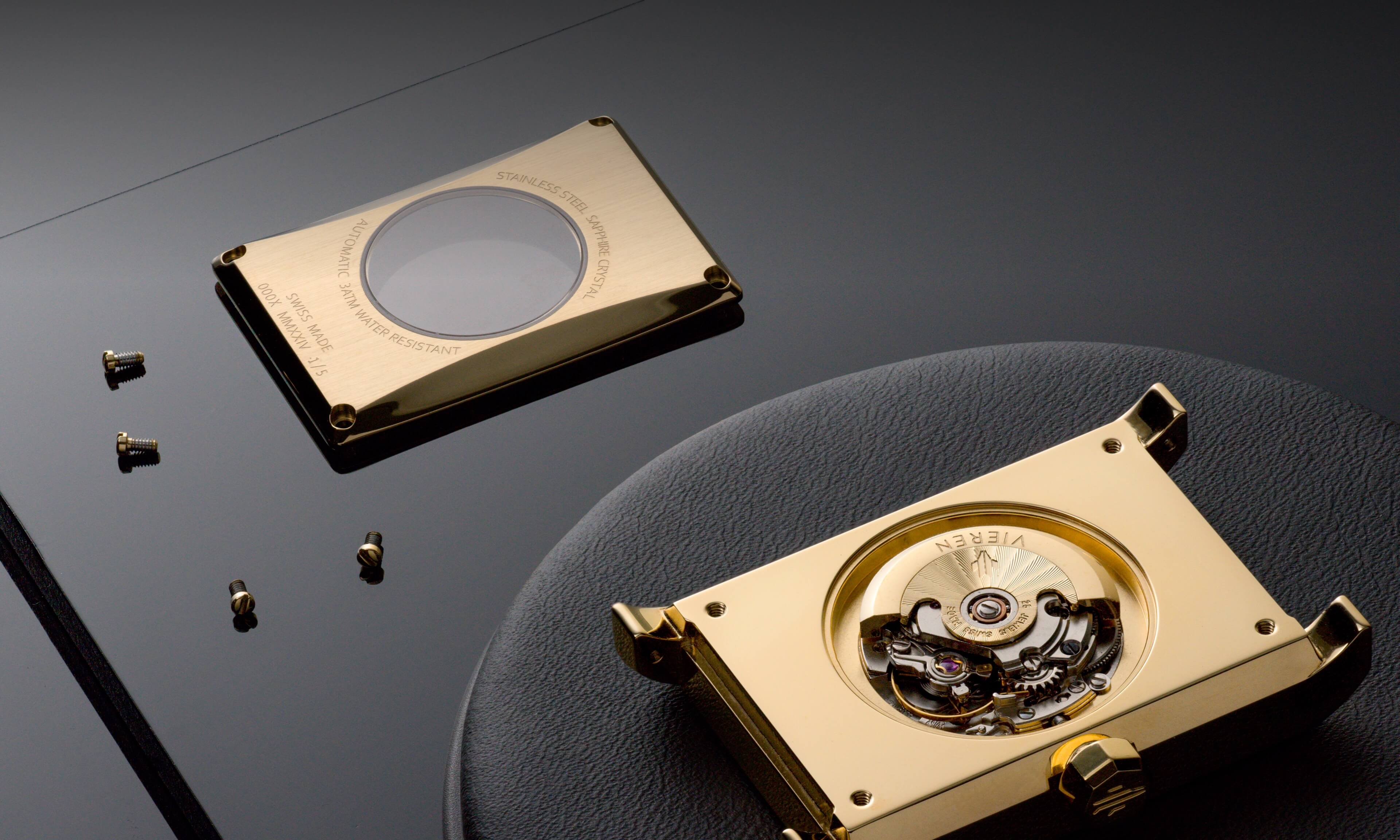 VIEREN gold rectangular watch caseback removed revealing Swiss ETA 2671 automatic movement