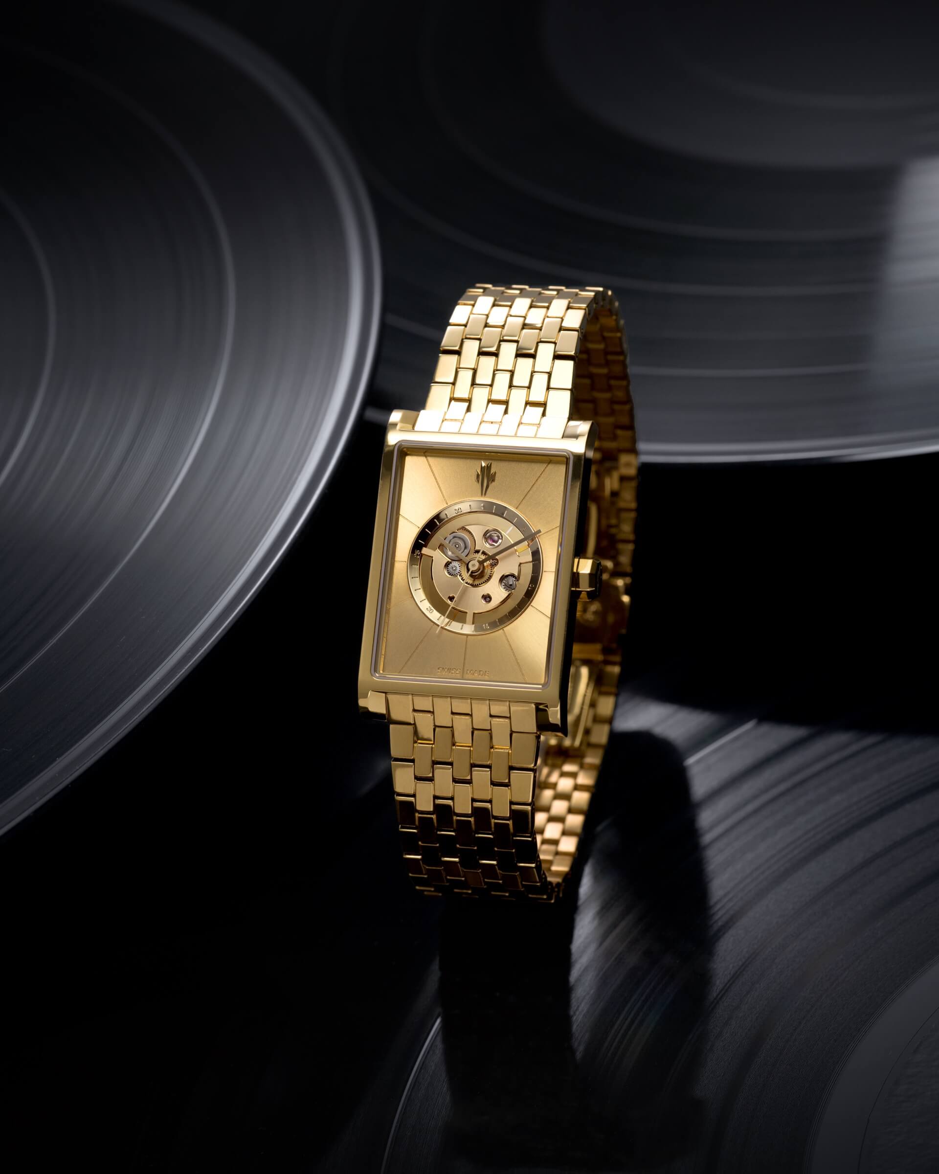 VIEREN Gold Sunray rectangular watch inspired by Studio 54 glamour