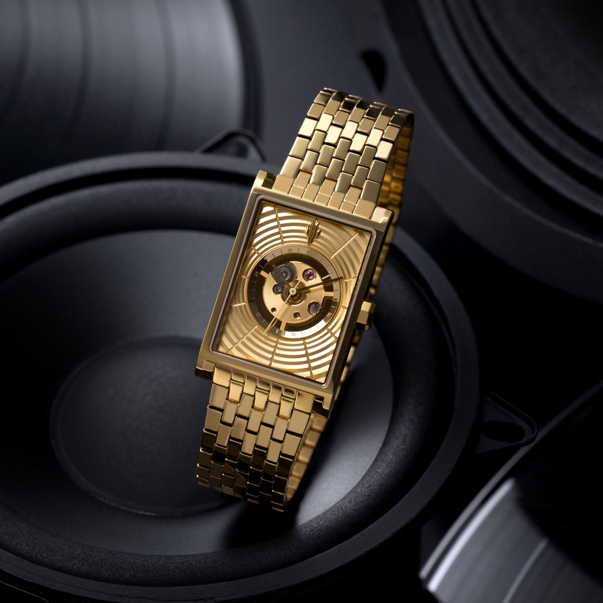 VIEREN Gold Waves rectangular watch with skeleton dial and speaker inspiration