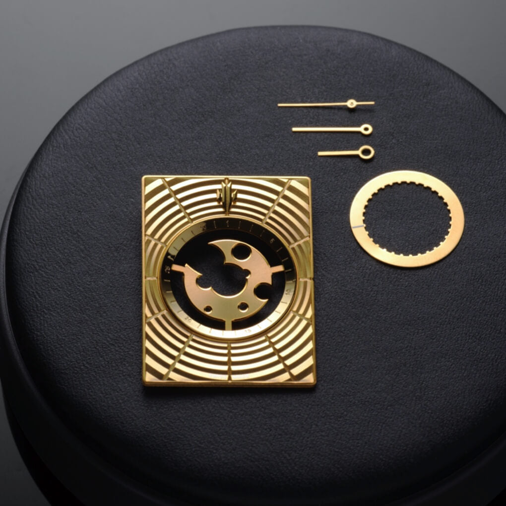 VIEREN Gold Waves rectangular watch dial with polished skeleton design and gold hands