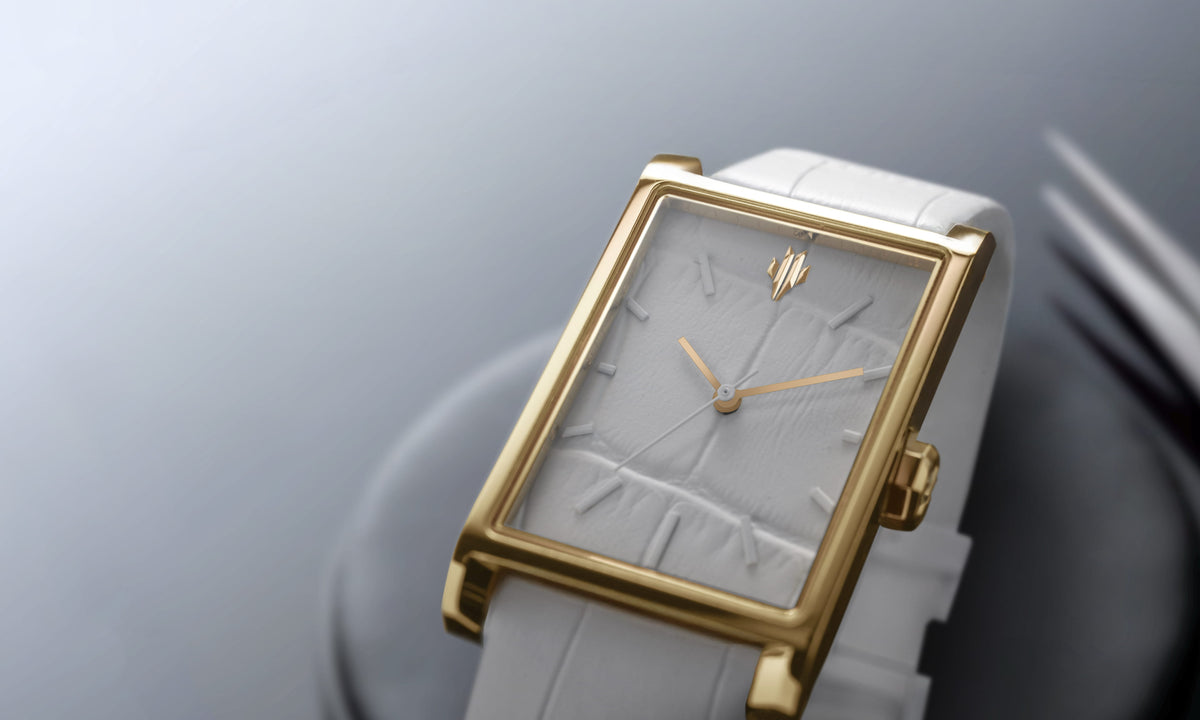 VIEREN Gold White Croc leather gold rectangular watch with white leather dial, gold hands, and matte white indices close-up