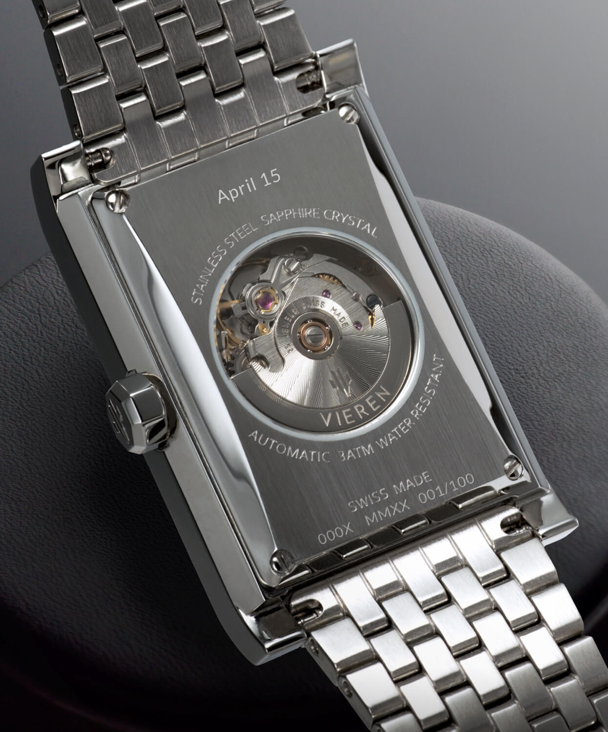 VIEREN silver rectangular watch caseback with "April 15" date engraving