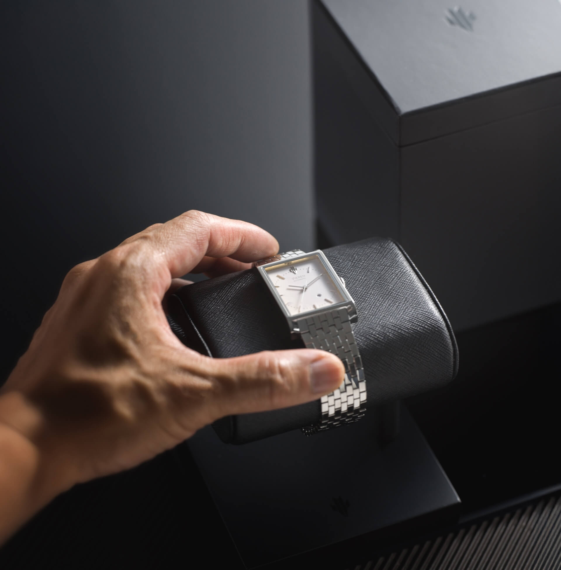 VIEREN luxury watch on vegan leather stand with eco-friendly packaging