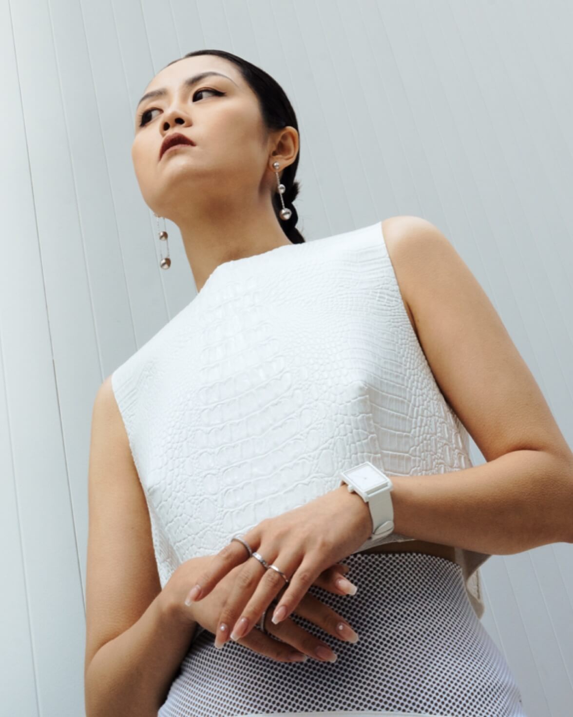 Yuki Zhao wearing the VIEREN White Croc Leather rectangular watch