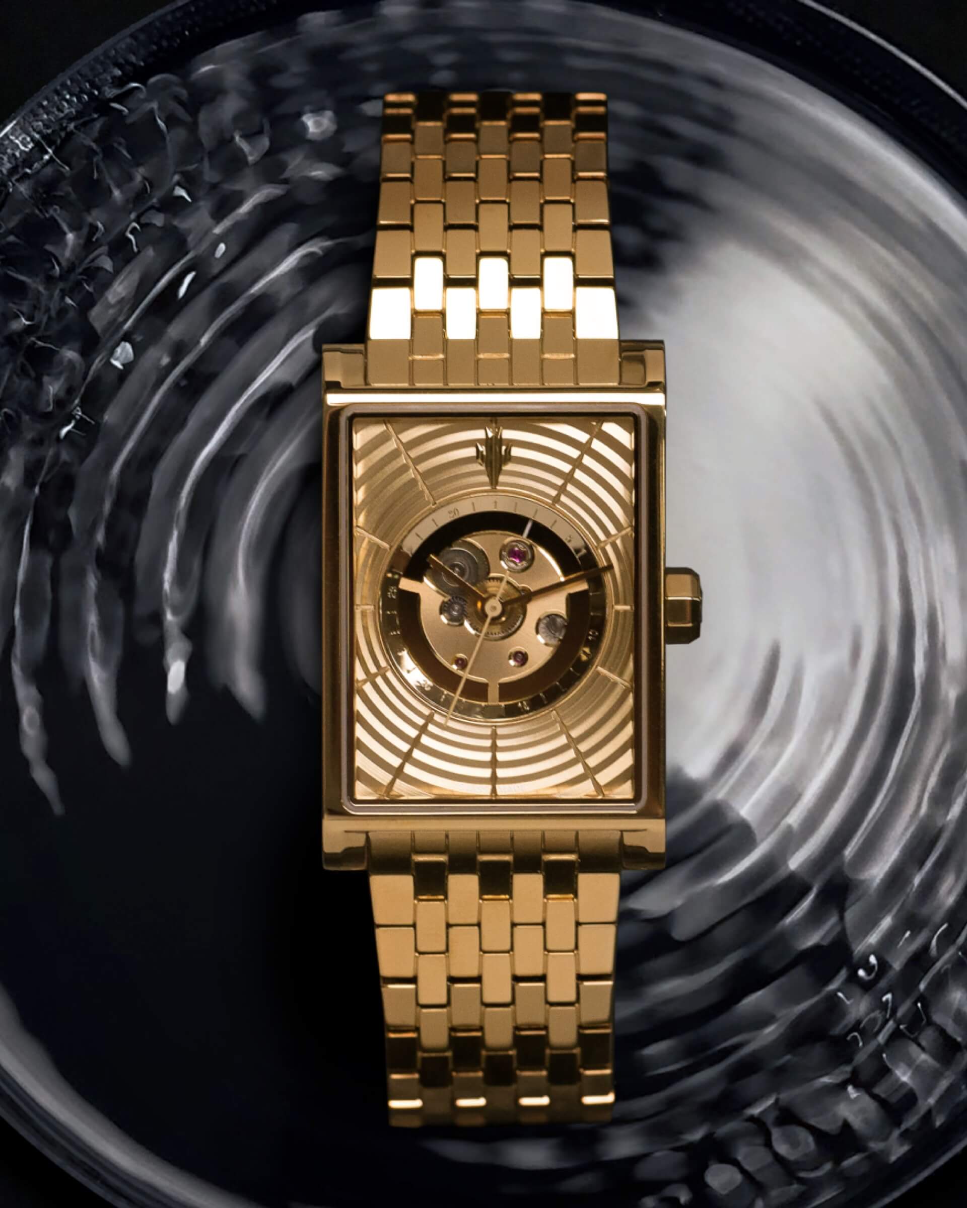 Revolution feature with VIEREN Gold Waves rectangular watch