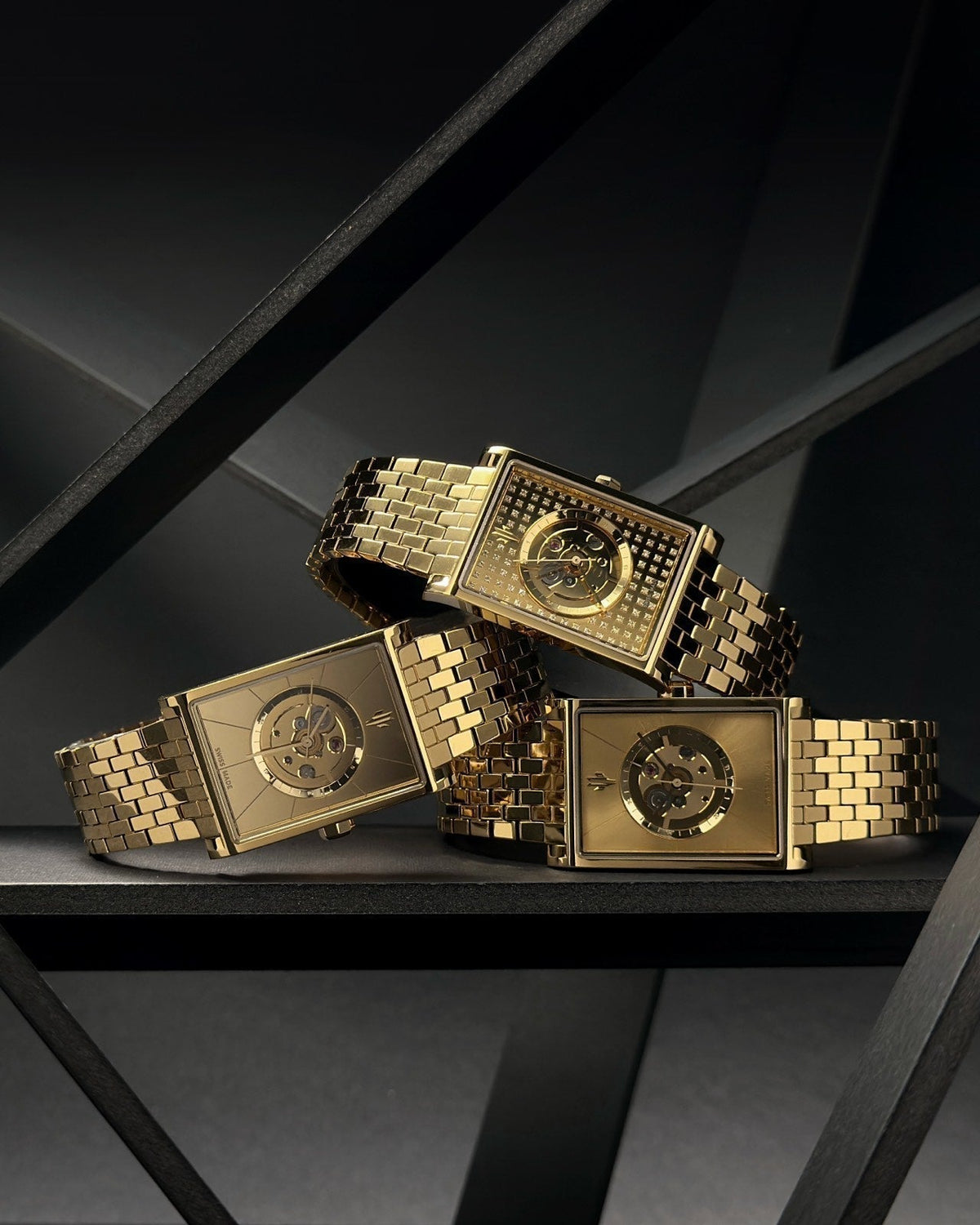 Modern luxury gold rectangular watches with Swiss automatic movements, diamond and skeleton dials trio