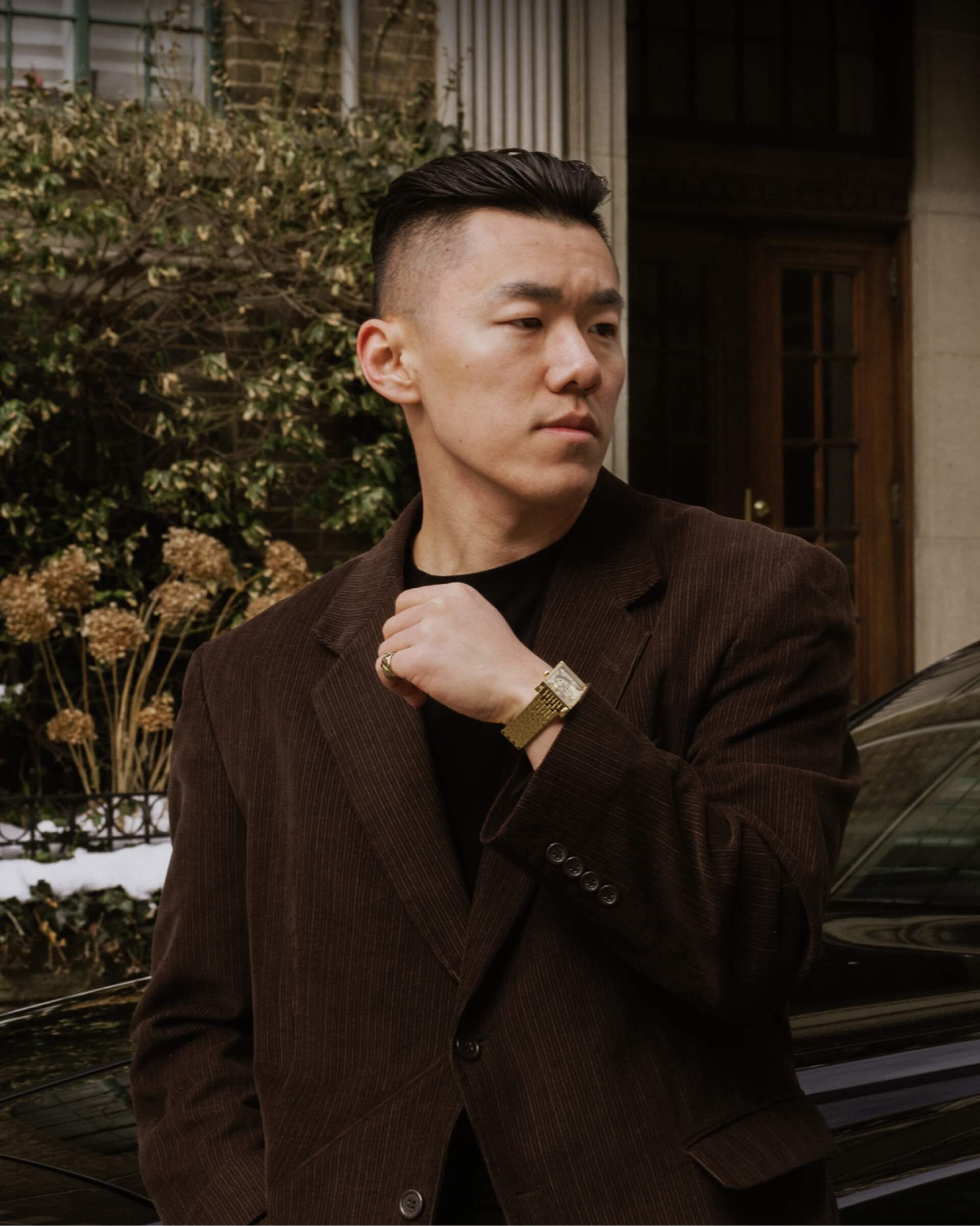 Jia Zhang wearing VIEREN Gold Sunray rectangular watch