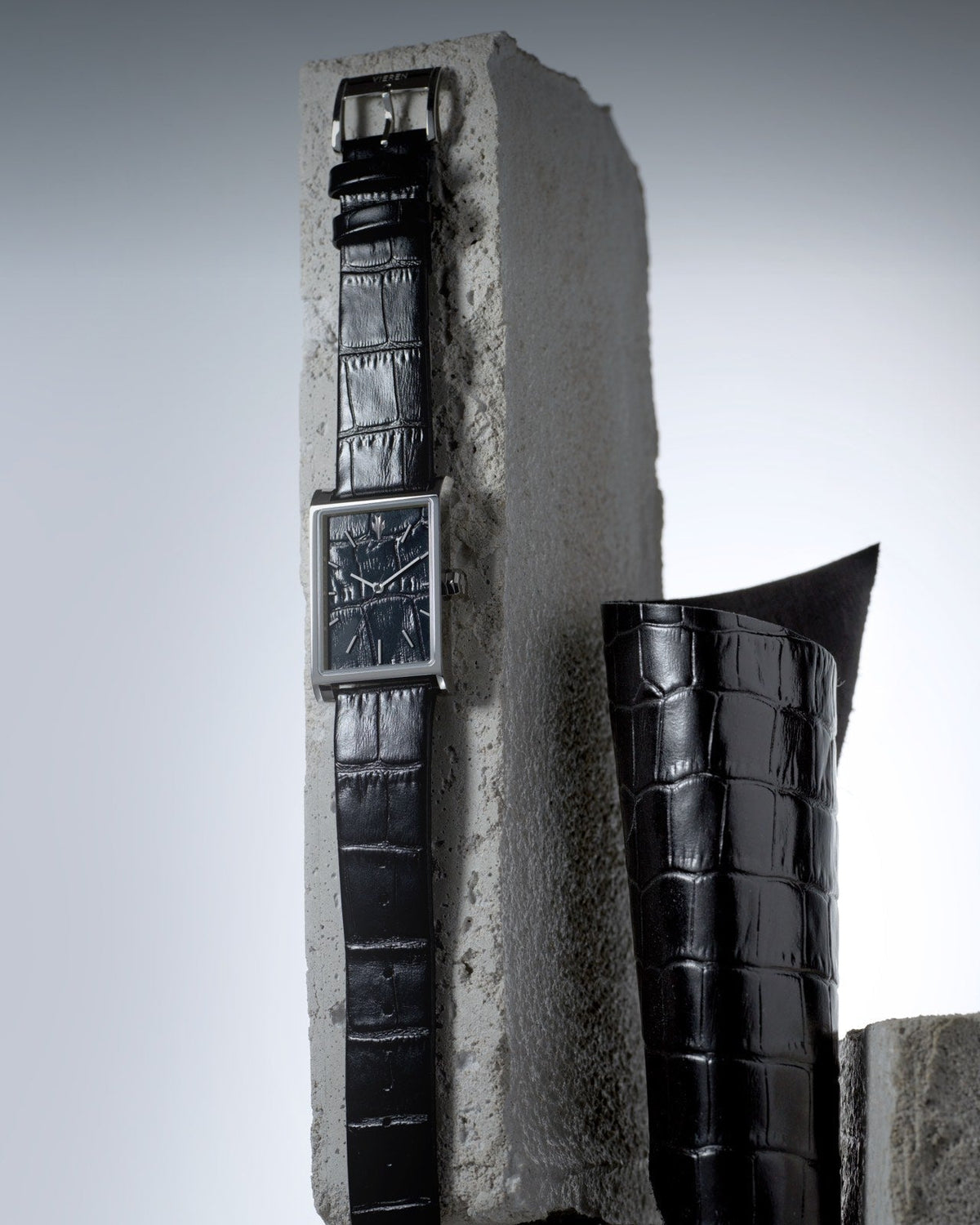 Luxury black leather rectangular watch with genuine leather dial and modern architecture inspiration