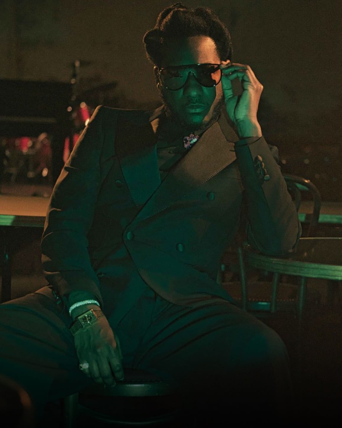 Leon Bridges wearing VIEREN Gold Stereo Diamond watch in suit at Studio 54 studio