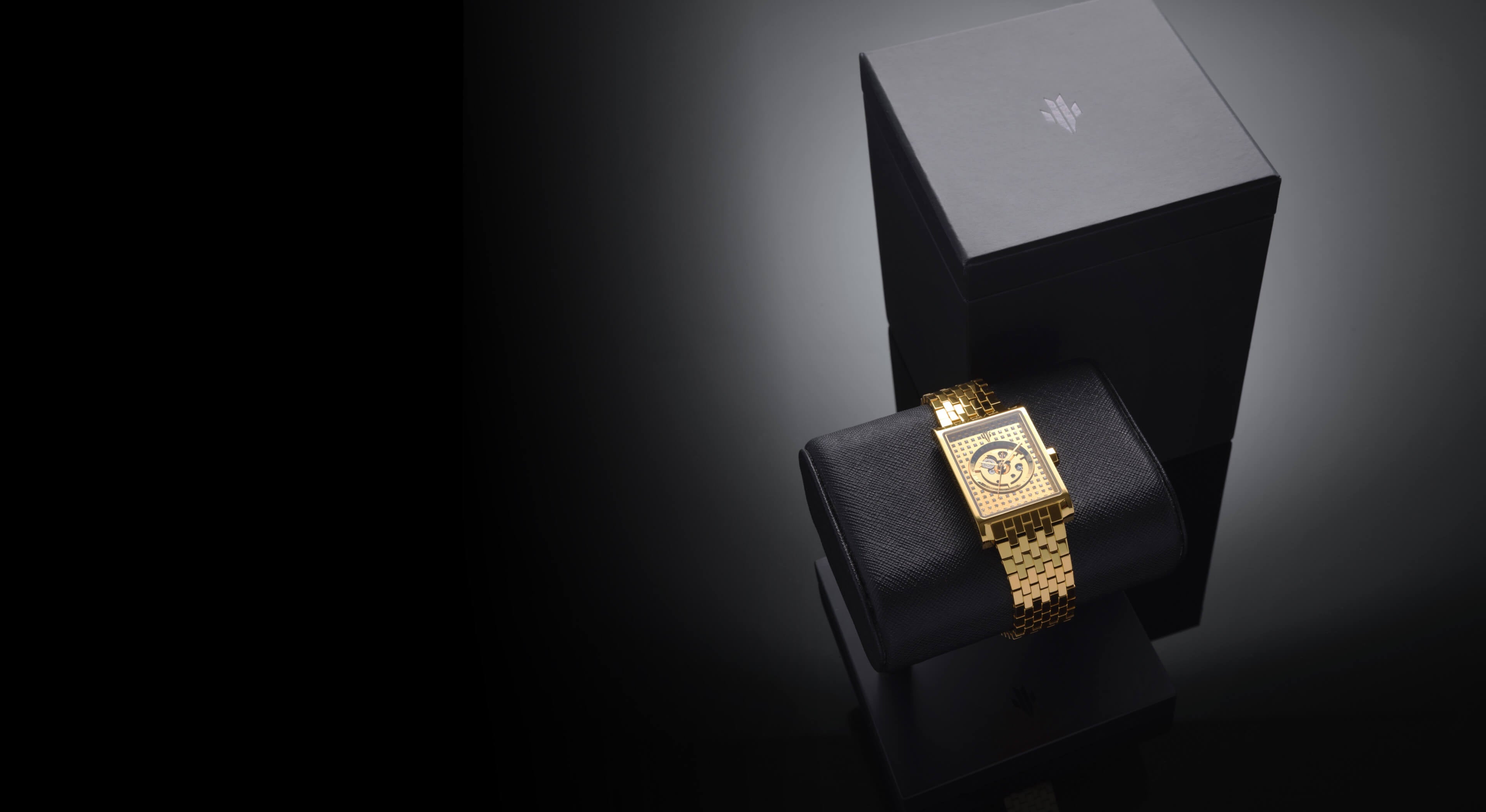VIEREN gold rectangular skeleton watch with diamond dial and sustainable packaging