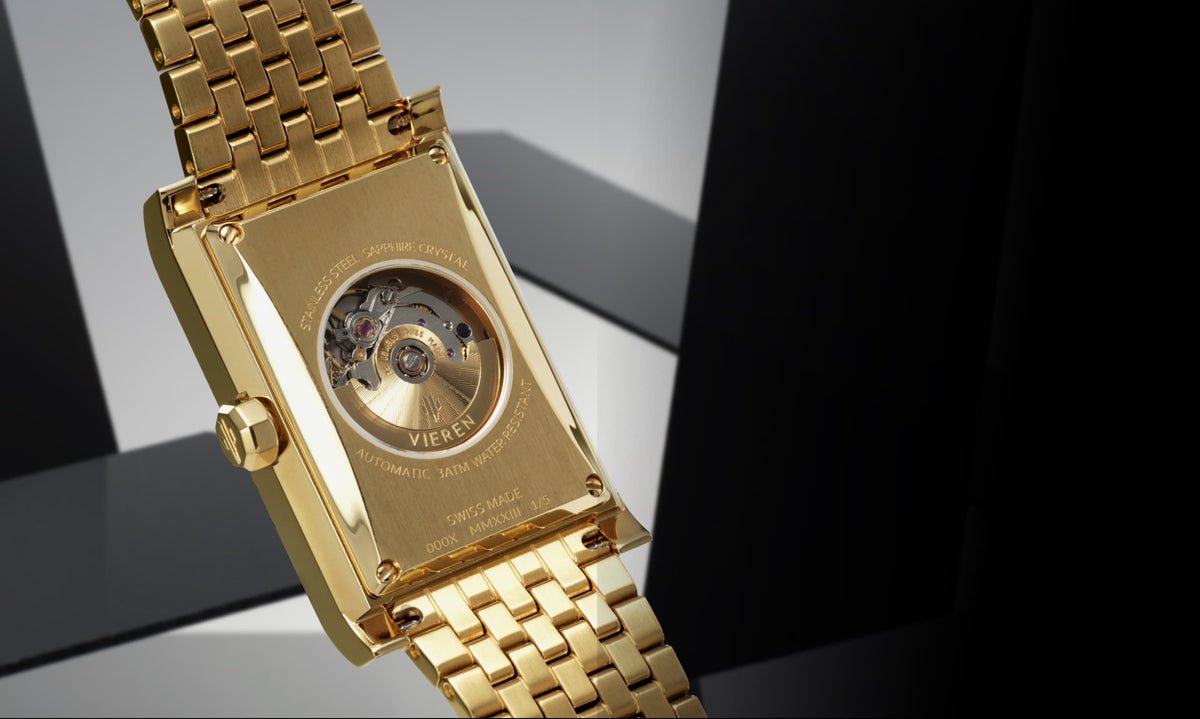 VIEREN gold rectangular watch caseback revealing Swiss ETA 2671 automatic movement