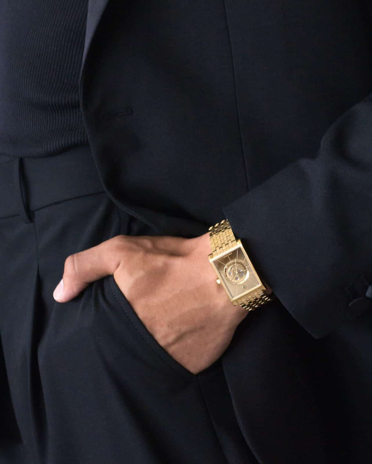 VIEREN men's gold rectangular watch styled with a black blazer