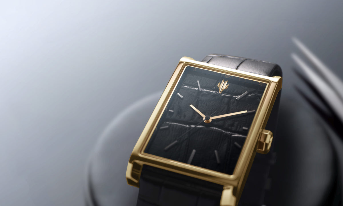 VIEREN Gold Black Croc leather gold rectangular watch with black leather dial, gold hands, and gunmetal indices close-up