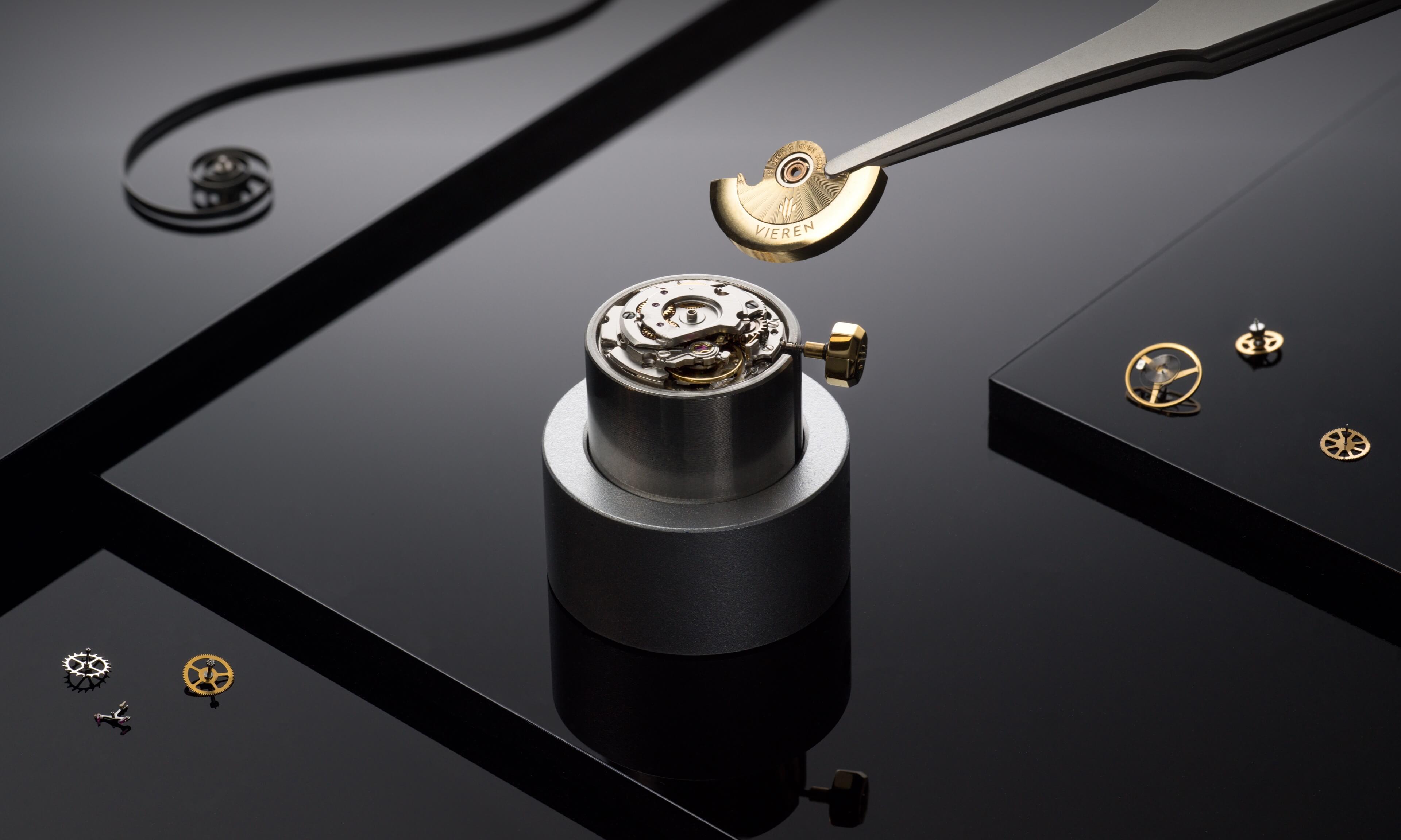 VIEREN Swiss Made automatic movement with gold rotor, escapement, balance wheel, and gears