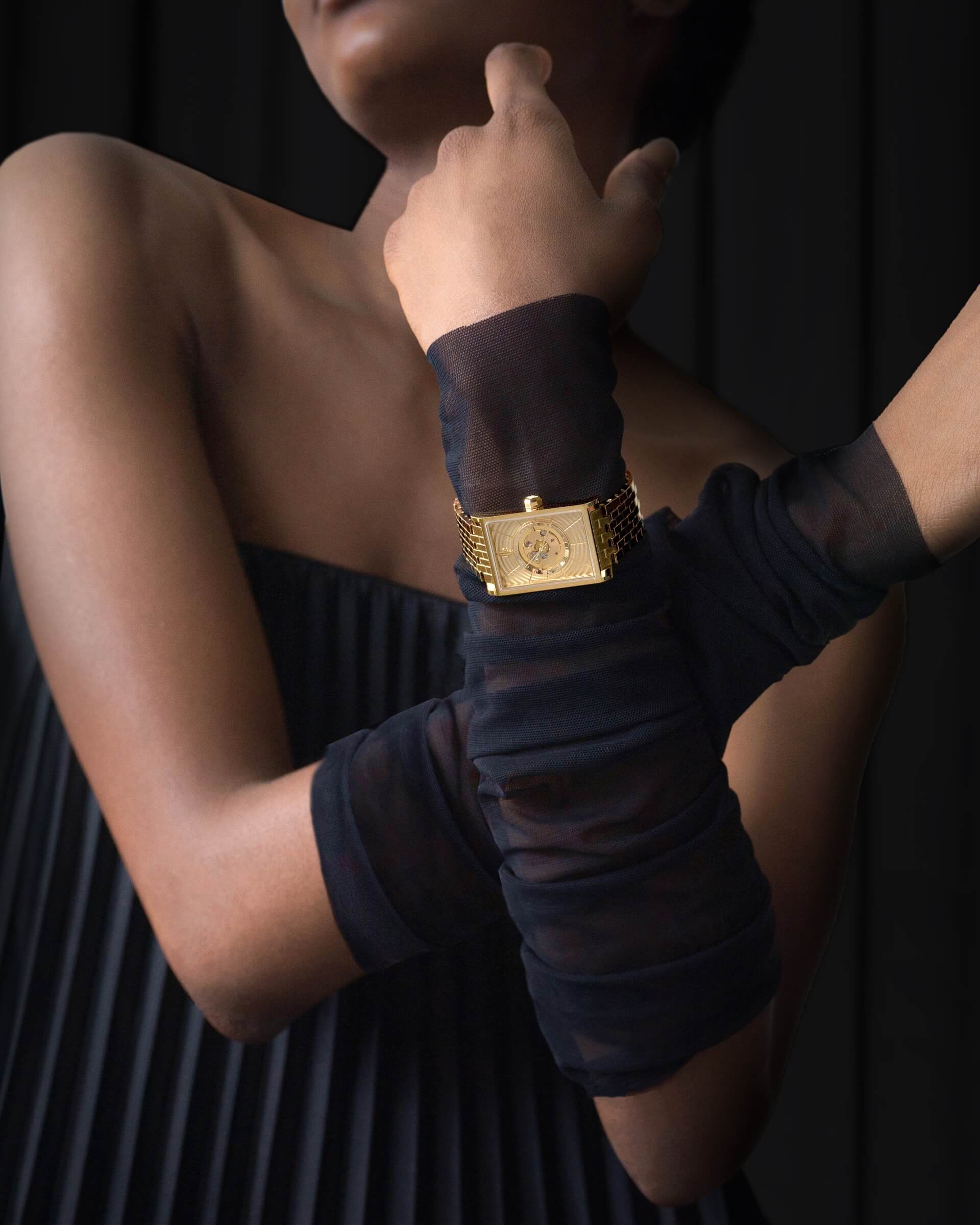 VIEREN women's gold rectangular watch styled with black dress